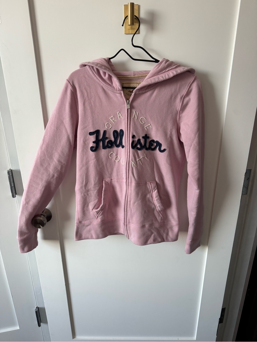 Hollister Light Pink Hooded Zip-Up Sweatshirt with Navy Logo